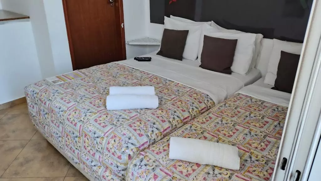Suíte Triplo Superior Luxo com Varanda Vista lateral